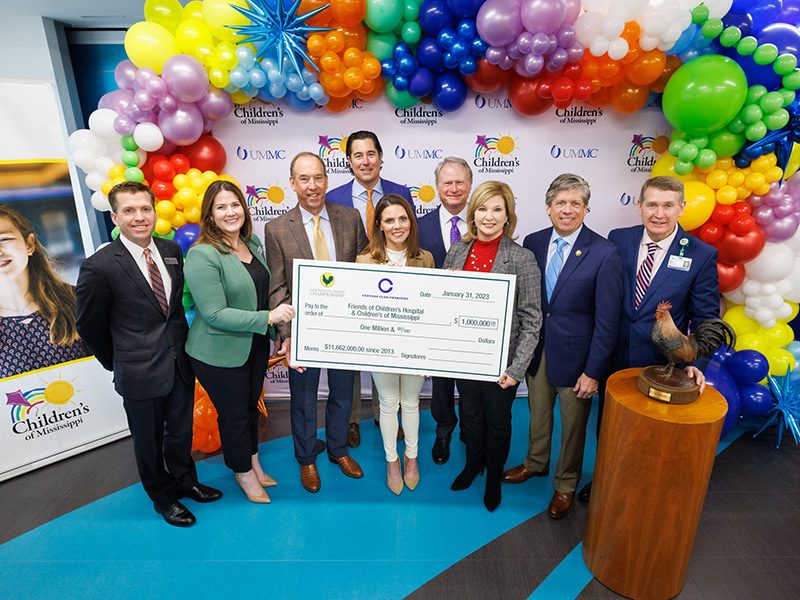 Celebrating the $1 million gift from Century Club Charities are, from left, John Scarbrough, board chairman of Friends of Children's Hospital; Caitlin Foreman, Friends of Children's Hospital executive director; Bob "Pic" Billingsley, senior vice president and general manager of retail sales for Wayne-Sanderson Farms; Dr. JR Woodall, secretary of Century Club Charities; Hilary Burroughs, Wayne-Sanderson Farms director of marketing; Johnny Lang, treasurer of Century Club Charities; Dr. LouAnn Woodward, vice chancellor for health affairs and dean of the School of Medicine; Steve Jent, executive director of the Sanderson Farms Championship; and Guy Giesecke, CEO of Children's of Mississippi.